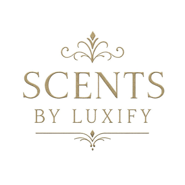 Elegant gold decorative logo with the text Scents by Luxify featuring ornamental flourishes above and below the words